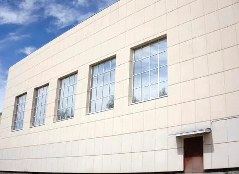 Building with facade cladding, close up Stock Photos