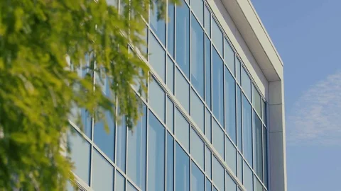 Building facade with glass windows selective focus Stock Footage 102377738