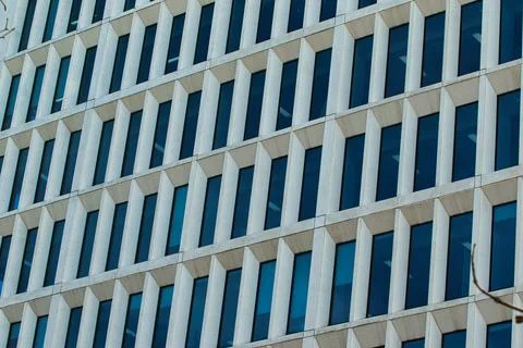 Building Facade with Rectangular Windows in Manchester, UK. Stock Photos