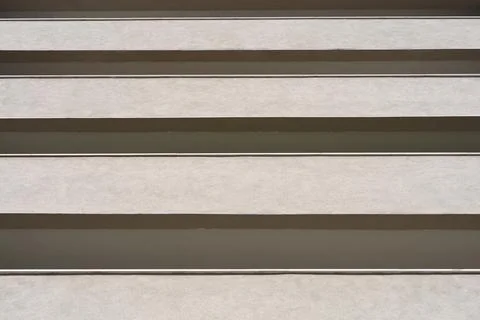 Building facade with rows of concrete balconies Stock Photos