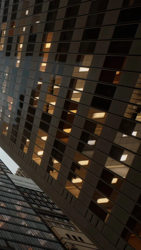 Building facade shows light patterns at different times of the day Stock Footage 338413411