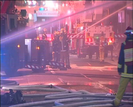 Building Fire with Fire Fighters using a ladder platform Stock Footage 138204