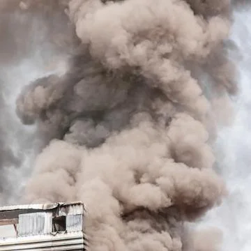 Building on fire Stock Photos