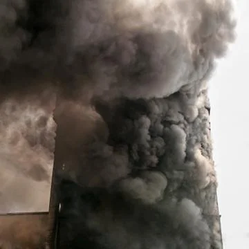 Building on fire Stock Photos