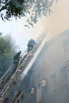 Building on fire Stock Photos