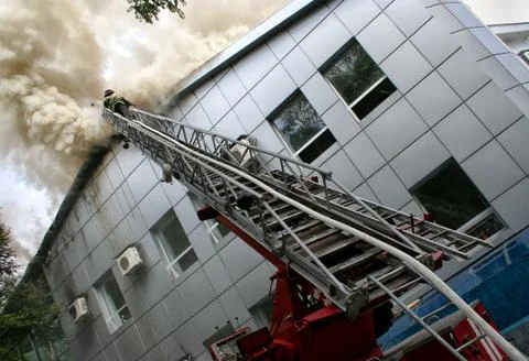 Building on fire Stock Photos