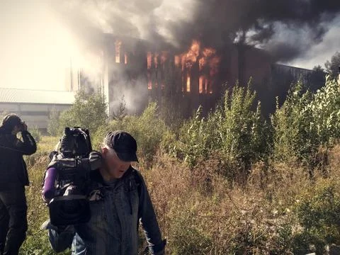 Building on fire Stock Photos