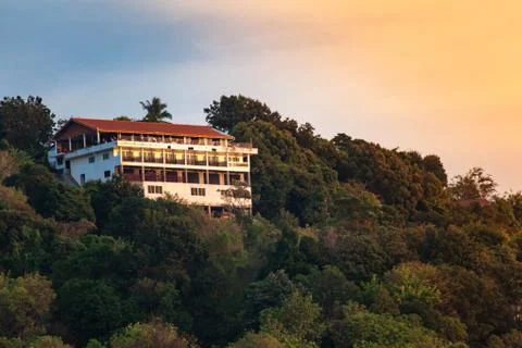 Building in the forest on the top of hill Stock Photos
