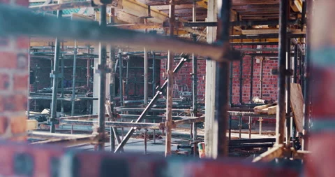 Building, framework and scaffolding on construction site for civil engineering Stock Footage 336806168