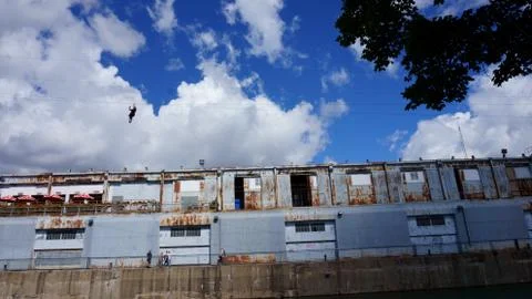 Building in front clouds Stock Photos