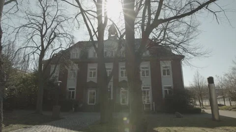 Building from the front with trees and buildings Stock-Footage 237520046