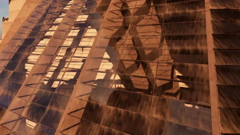 Building with glass and shadows in the evening sun Video stock 344133702
