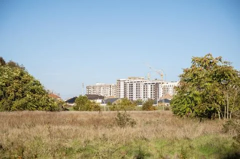 A building with a grassy field Stock Photos
