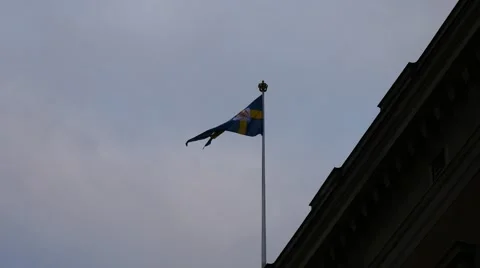 A building at Gustav Adolf's square and the swedish flag in Stockholm 스톡 동영상 60607621