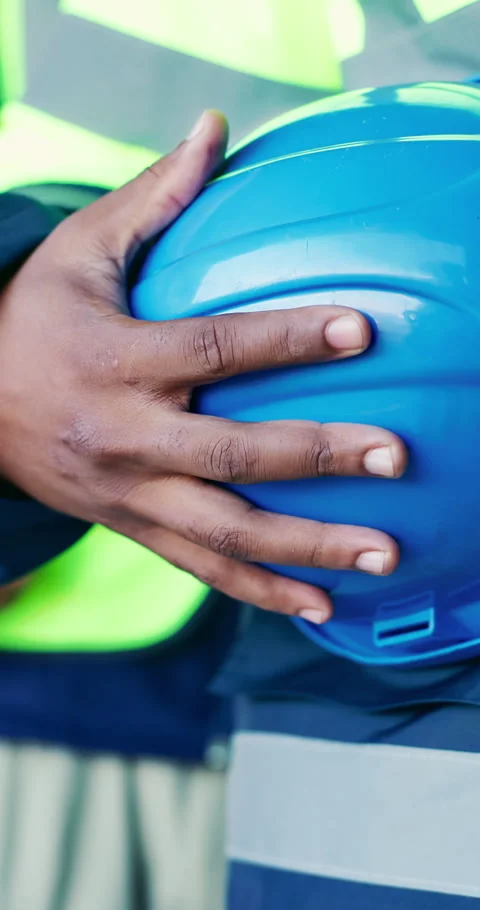Building, hands and man with helmet for construction, planning and blueprint for Stock Footage 337023160