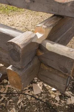 Building a house in old technology using knot timber Stock Photos