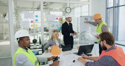 Building industry concept where good-looking professional experienced Stock Footage 145808667