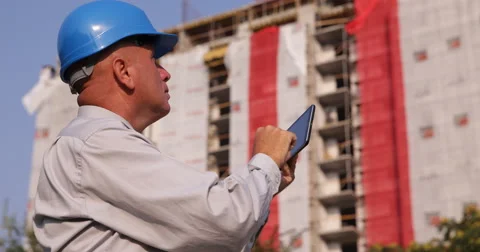 Building Industry Investor Checking Technical Plans Use Touch Tablet Connection Stock Footage 61455861