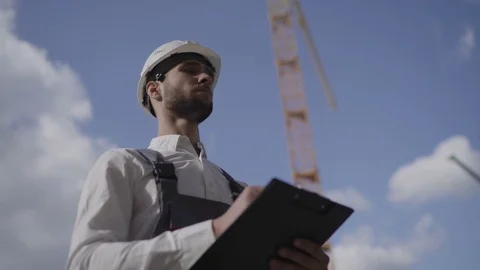 Building Inspector at Construction Site Stock Footage 81596802