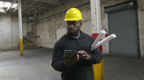 Building inspector with tablet Stock Footage 48704815