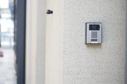 Building intercom system on wall outside entrance Stock Photos