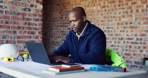 Building, laptop and thinking with black man on construction site for planning Stock Footage 336777679