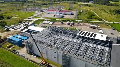 Building large data center facility with roof structure and cooling systems.. Stock Photos