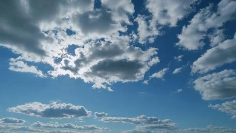 Building of a large white cloud in the blue sky. Clouds moving in blue sky with Stock Photos