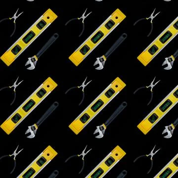Building level and tools seamless pattern isolated on black background. Fotos de archivo