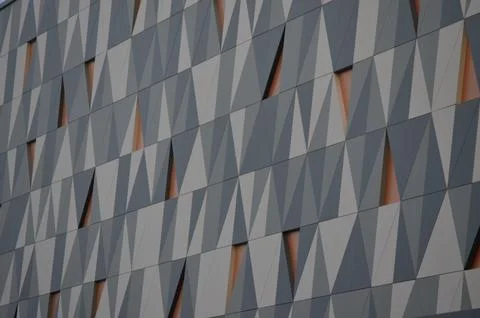 A building with a lot of triangles on it.  Stock Photos