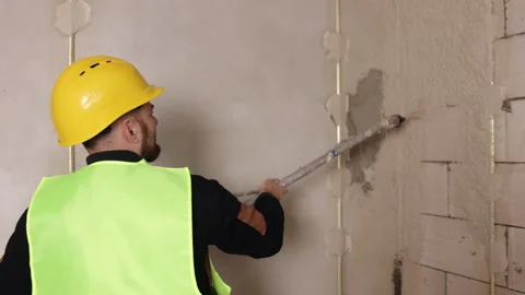 Building by machine, skilled labor, cement render Vidéo 341431082