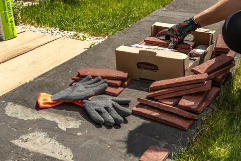 Building materials, bricks, mortar and tools for plastering and tiling plac.. Stock Photos