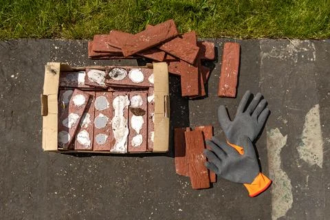 Building materials, bricks, mortar and tools for plastering and tiling plac.. Stock Photos