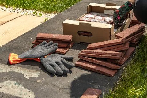 Building materials, bricks, mortar and tools for plastering and tiling plac.. Stock Photos