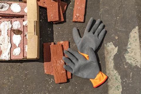 Building materials, bricks, mortar and tools for plastering and tiling plac.. Stock Photos