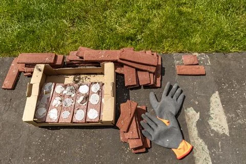 Building materials, bricks, mortar and tools for plastering and tiling plac.. Stock Photos