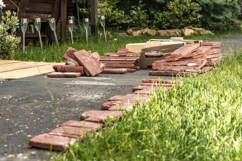 Building materials, bricks, mortar and tools for plastering and tiling plac.. Stock Photos