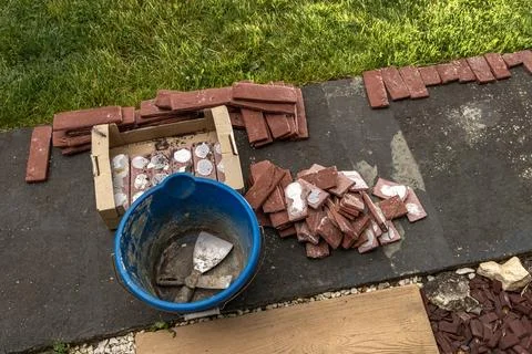 Building materials, bricks, mortar and tools for plastering and tiling plac.. Stock Photos