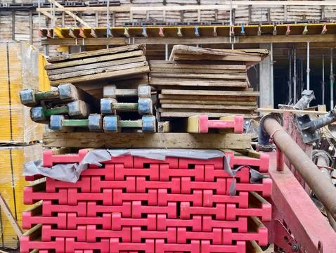 Building materials including formwork and scaffolding prepared for upcoming.. Stock Photos