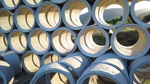 Building materials in packages, pallets stored in field at construction site Stock Footage 137959256