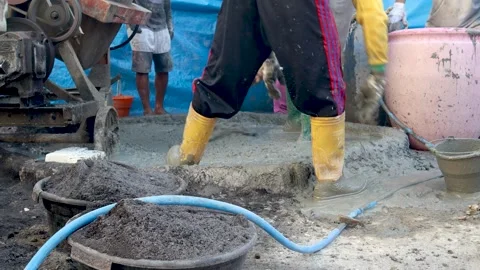Building materials. split stone mix with cement and black sand to build a house Stock Footage 241911842