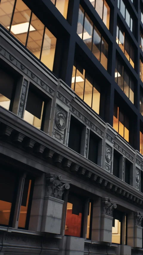 Building with a mix of modern and classic design in a city setting Stock Footage 340258374