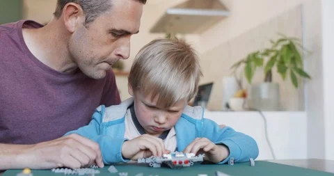 Building model aeroplane together Stock Footage 120351010