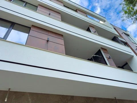 Building with modern design featuring multiple levels and flat surfaces und.. Stock Photos