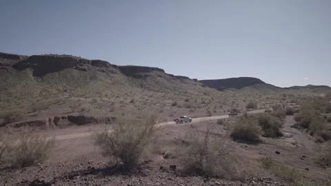 A building with a mountain in the desert Video stock 156018256