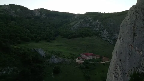 Building in a mountain valley during dusk Stock-Footage 345166046