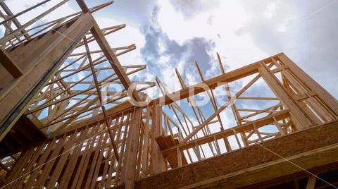 Building of New Home Construction exterior wood beam construction Stock Photos