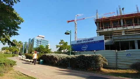 Building new intel building PTK1  in Petach Tikva - Builder is walking around Stock Footage 81486253