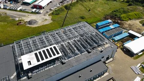 Building new large data center facility infrastructure with rooftop cooling Stock Photos