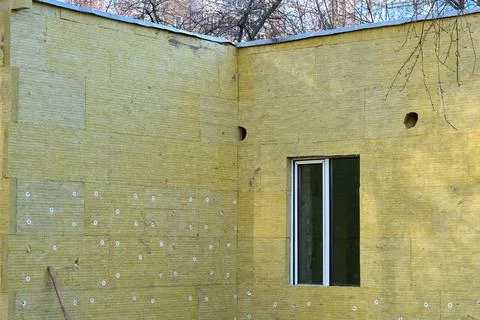 Building with new window and facade thermal insulation panel Stock Photos